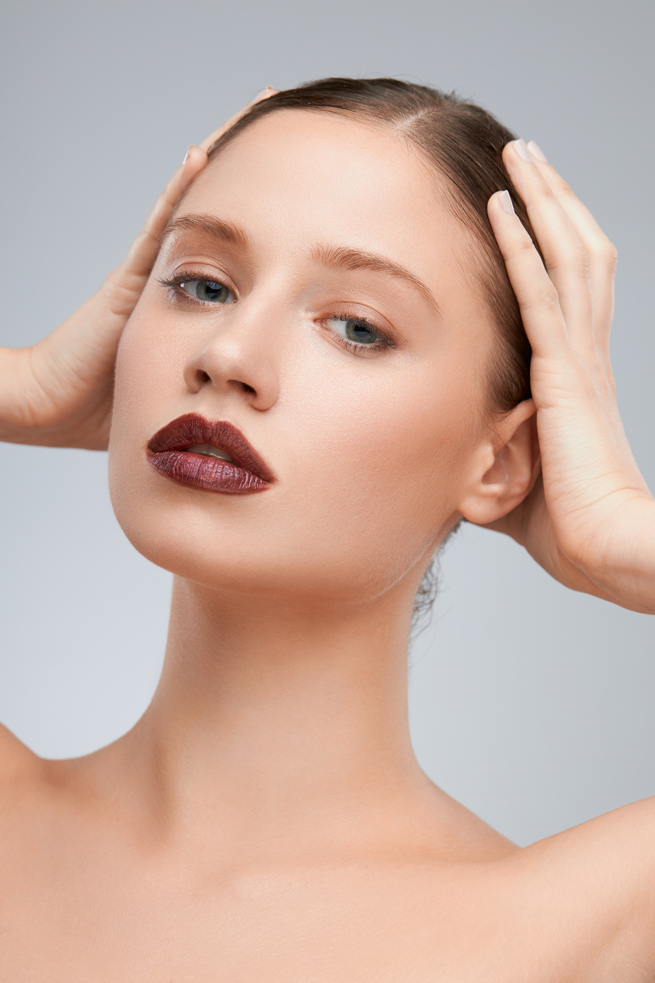 Beautiful lady posing with brown lipstick. Beauty photography